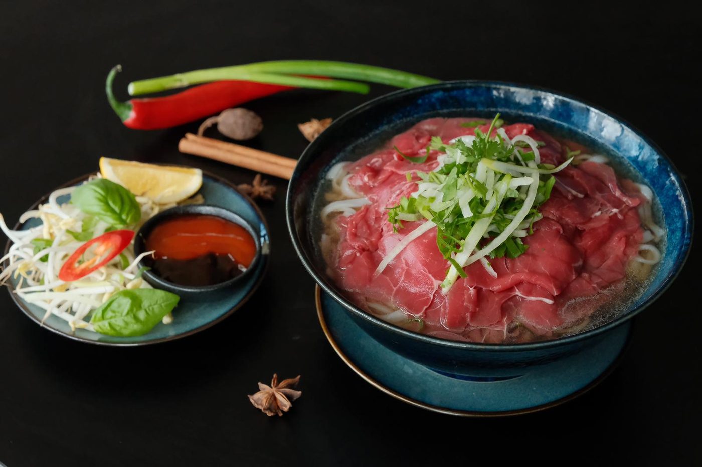 Rare beef pho with rice noodles, herbs, bean sprouts and chilli